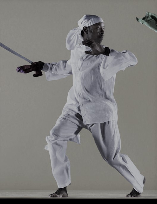 Dancers performing on stage.