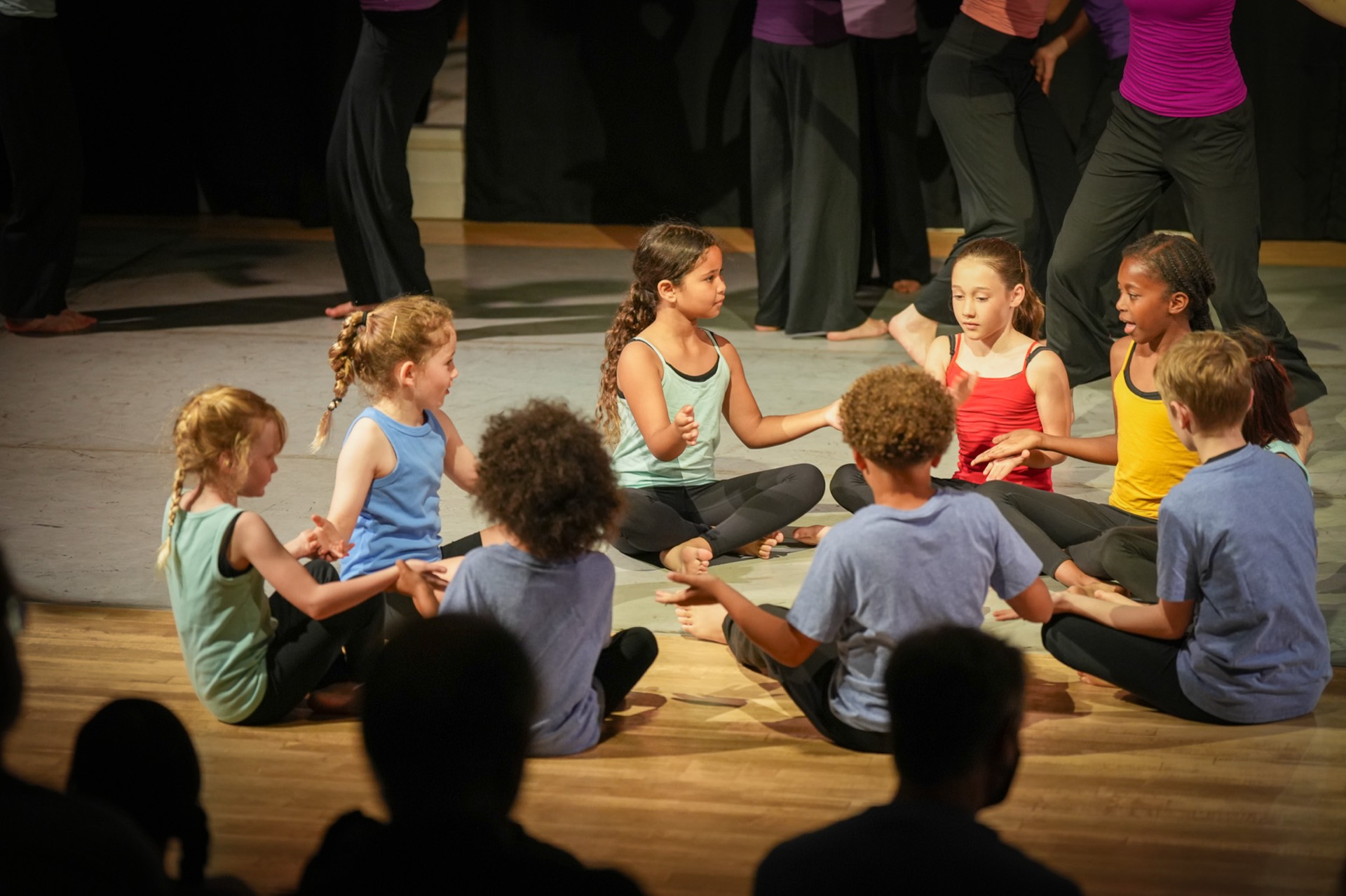 Young TWDCC company dancers sharing the stage.