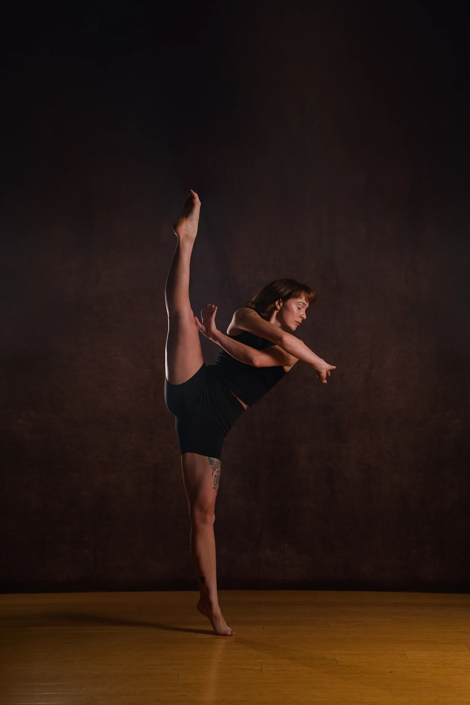 Nicolette Hernandez-Kaempf performing a ballet-inspired jazz pose.